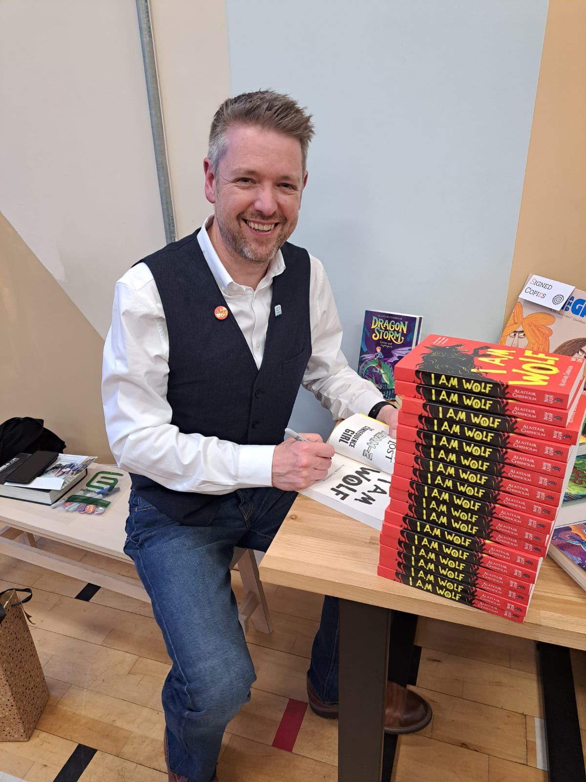 Alastair Chisholm signing copies of I Am Wolf