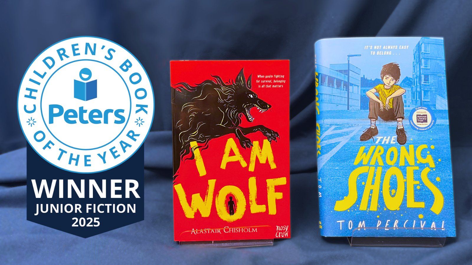 A poster showing the Peters Award, and the books I Am Wolf by Alastair Chisholm and The Wrong Shoes by Tom Percival