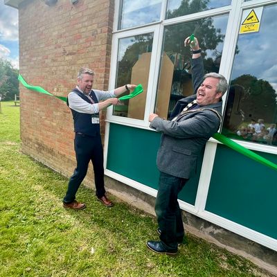 Alastair Chisholm and Amersham Mayor Dominic Pinkney cutting the ribbon on the new library